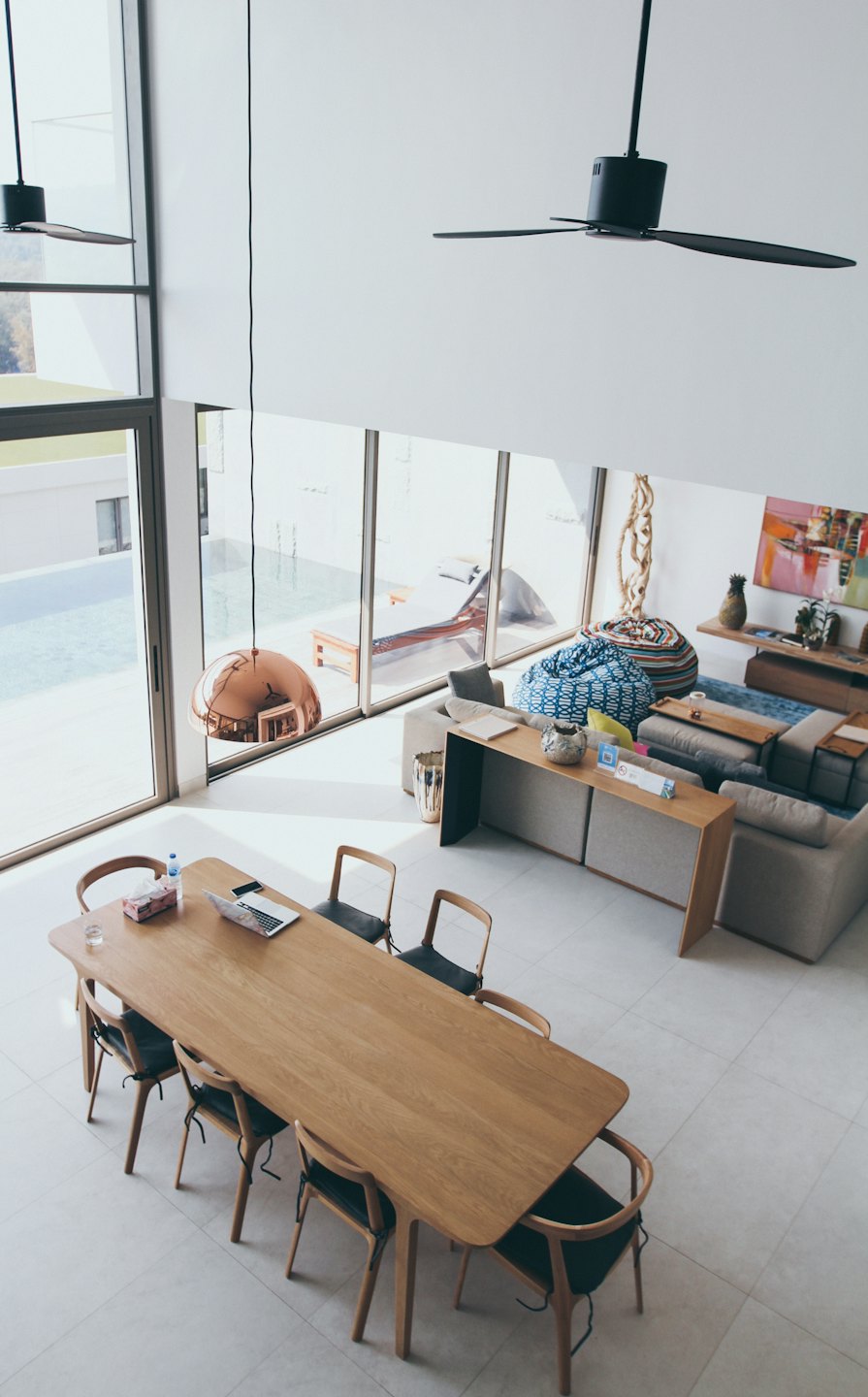 Aerial view of a modern open-plan living and dining area.